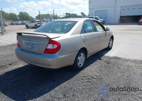 2002 Toyota Camry Le V6 z USA, uszkodzony, nr VIN 4T1BF32K62U032773